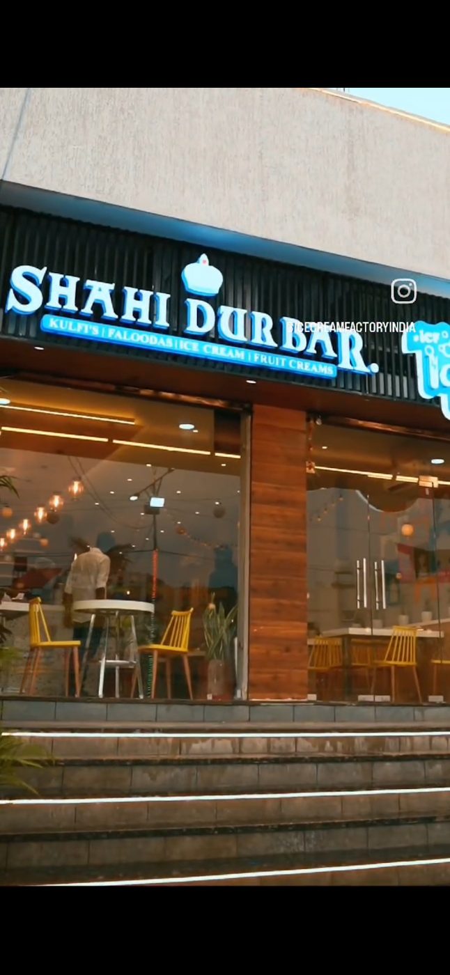 Shahi Durbar shop front with lit sign